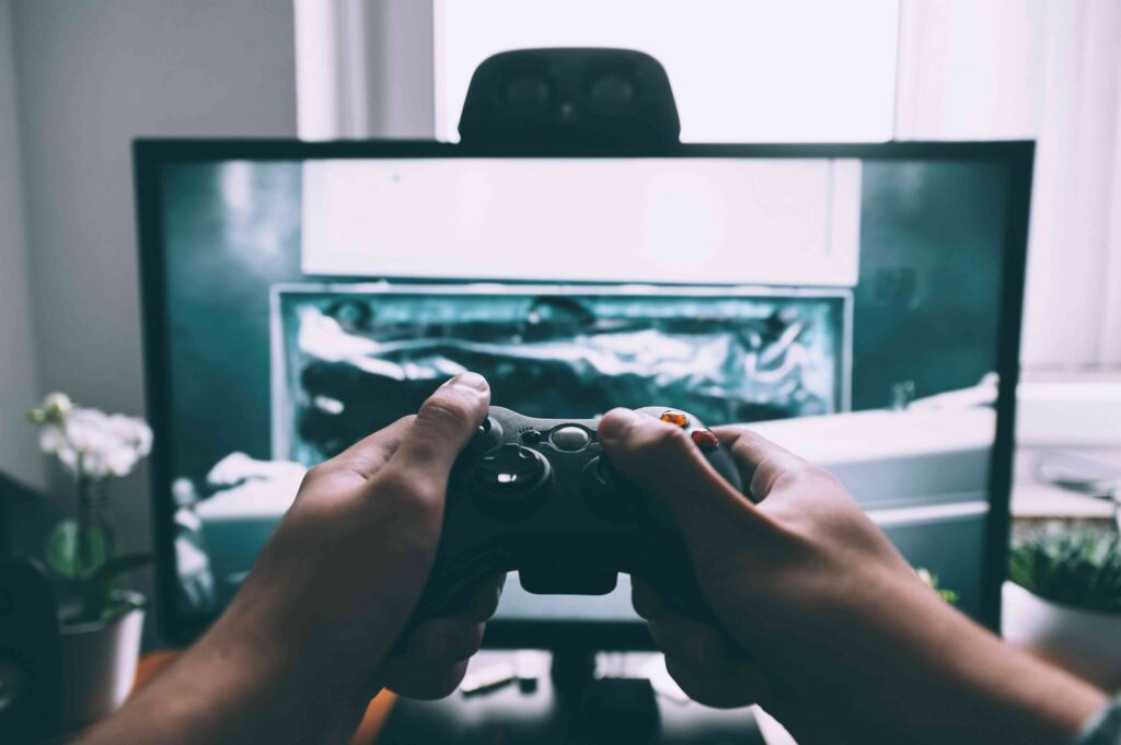 Streamer using retro controller for Twitch in 2025